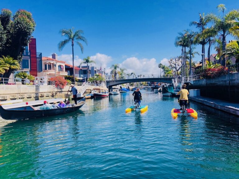 Hydrobikes on the Naples canals on a clear day