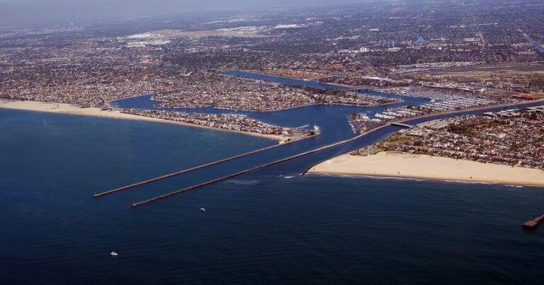 Aerial view of the Alamitos Bay entrance jetties, Alamitos Bay Landing and the marina in Long Beach