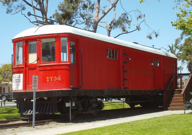 Red Pacific Electric car 1734 on a short track beside the Seal Beach Greenbelt