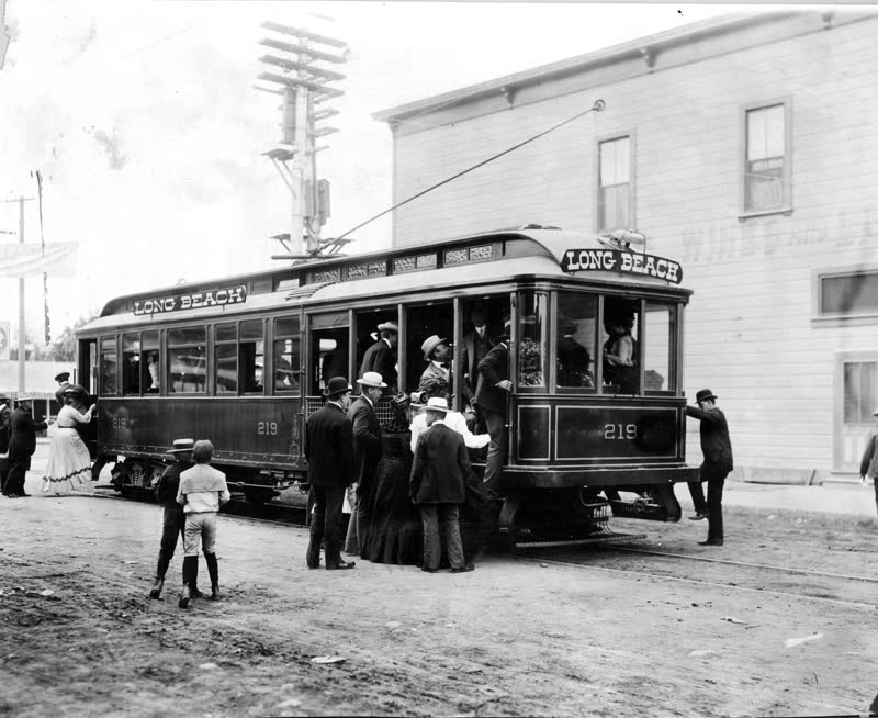 Passengers boarding Pacific Electric car 219 marked Long Beach in 1902