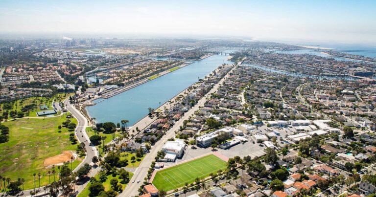 Aerial view of Marine Stadium in Long Beach, the long straight rowing course at the top of Alamitos Bay, with the Second Street bridge in the distance
