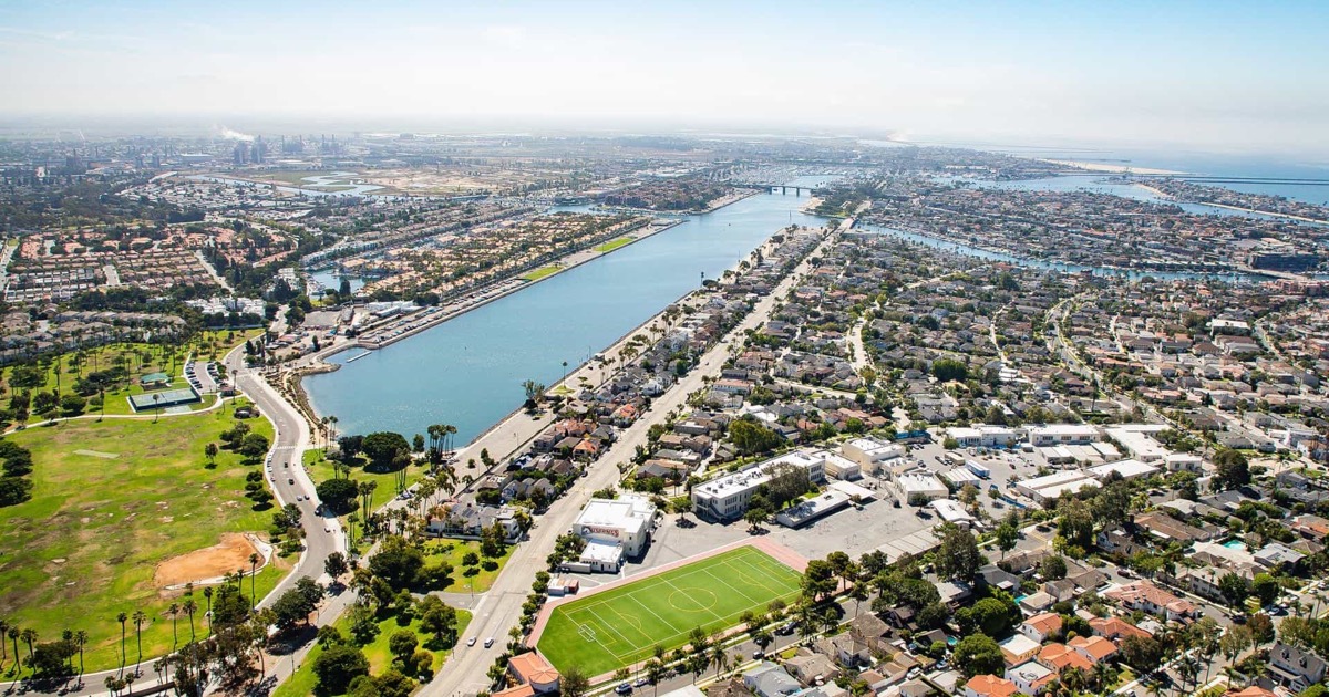 Aerial view of Marine Stadium in Long Beach, the long straight rowing course at the top of Alamitos Bay, with the Second Street bridge in the distance