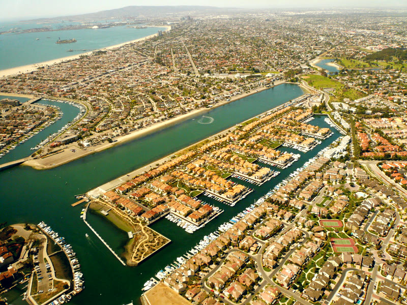 Aerial view of the long straight Marine Stadium rowing course in Long Beach between homes and marinas